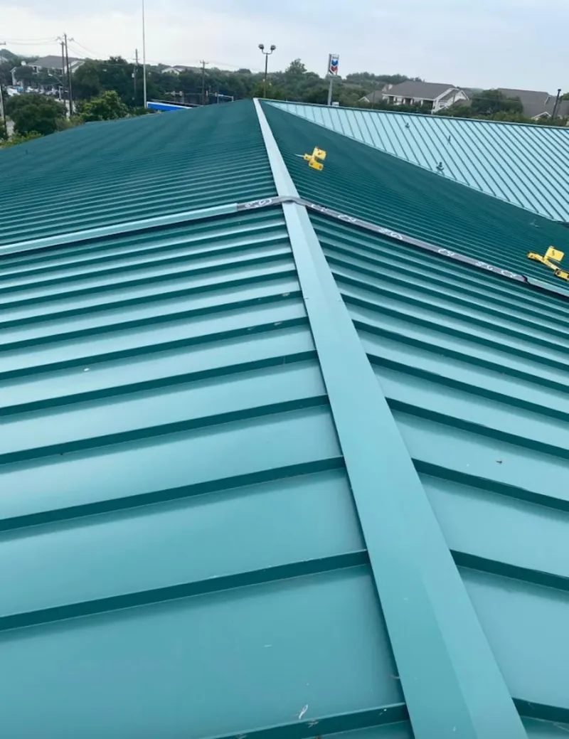 Green commercial metal roof ridge and valley for Metal Roof Repair in Granite Shoals